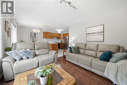 Living room featuring hardwood flooring and light gray walls - 200 Morrison Drive, Caledonia, ON - Indoor Photo Showing Living Room