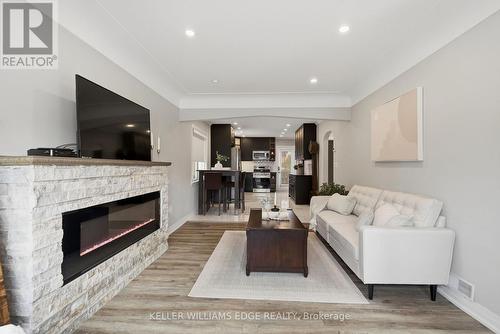 127 Tragina Avenue S, Hamilton, ON - Indoor Photo Showing Living Room With Fireplace