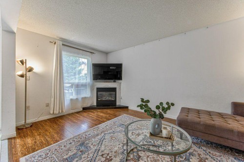 16 Westvillage Drive, Hamilton, ON - Indoor Photo Showing Living Room With Fireplace