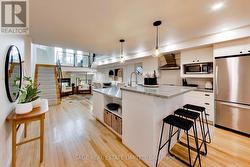 111 - 660 PAPE AVENUE Toronto, ON M4K 3S5