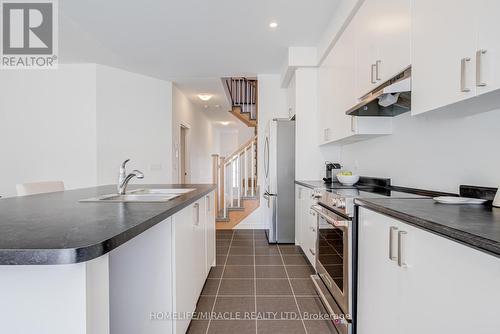 14 Sassafras Road, Springwater, ON - Indoor Photo Showing Kitchen With Upgraded Kitchen