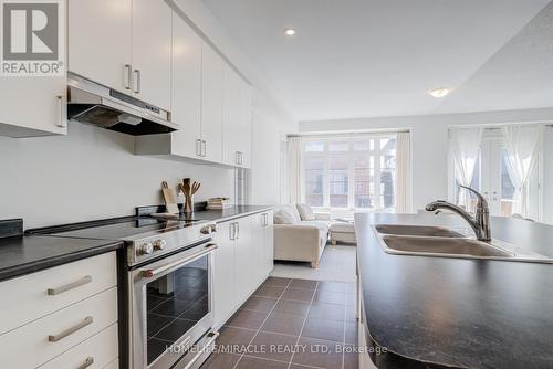 14 Sassafras Road, Springwater, ON - Indoor Photo Showing Kitchen With Stainless Steel Kitchen With Double Sink