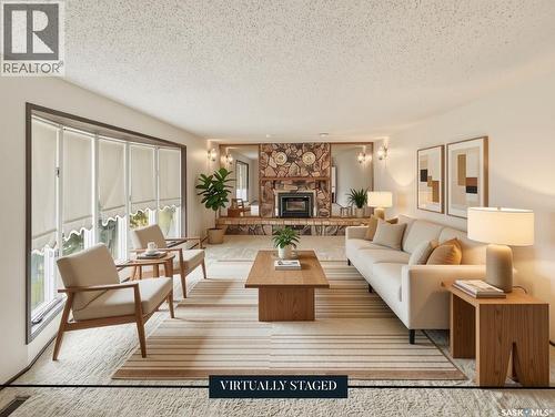 512 1St Street N, Cabri, SK - Indoor Photo Showing Living Room With Fireplace