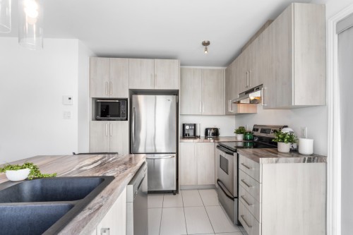 Cuisine - 9804 Rue Henri-Piché, Mirabel, QC - Indoor Photo Showing Kitchen With Double Sink