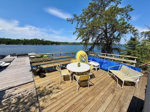 48 Sunset Trail, Kenora, ON - Outdoor With Body Of Water With Deck Patio Veranda With View