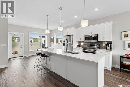 68 103 Pohorecky Crescent, Saskatoon, SK - Indoor Photo Showing Kitchen With Double Sink With Upgraded Kitchen