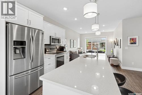 68 103 Pohorecky Crescent, Saskatoon, SK - Indoor Photo Showing Kitchen With Double Sink With Upgraded Kitchen