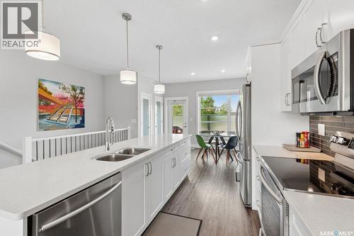 68 103 Pohorecky Crescent, Saskatoon, SK - Indoor Photo Showing Kitchen With Double Sink With Upgraded Kitchen