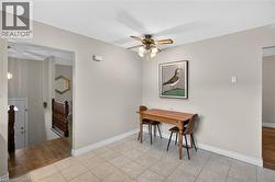 Neutral-toned walls complementing a tiled flooring surface - 