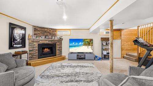 1244 Larch  S Drive, Cranbrook, BC - Indoor Photo Showing Living Room With Fireplace
