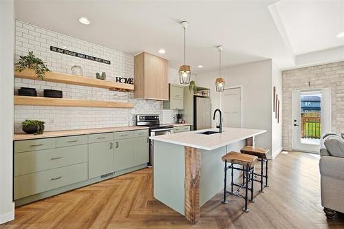 21 Glacier Bay, Steinbach, MB - Indoor Photo Showing Kitchen With Upgraded Kitchen