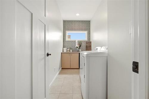 21 Glacier Bay, Steinbach, MB - Indoor Photo Showing Laundry Room