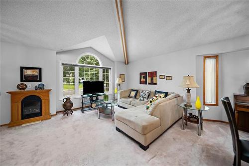 103 Poplynn Dr, Winnipeg, MB - Indoor Photo Showing Living Room With Fireplace