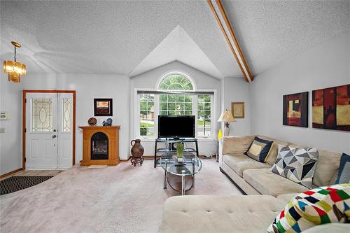 103 Poplynn Dr, Winnipeg, MB - Indoor Photo Showing Living Room With Fireplace