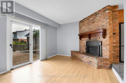 67 Ramsgate Private, Ottawa, ON - Indoor Photo Showing Living Room With Fireplace