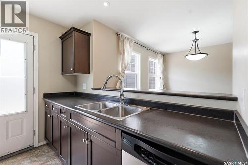 539 150 Langlois Way, Saskatoon, SK - Indoor Photo Showing Kitchen With Double Sink