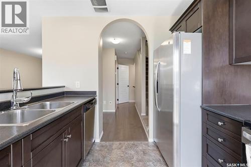 539 150 Langlois Way, Saskatoon, SK - Indoor Photo Showing Kitchen With Double Sink