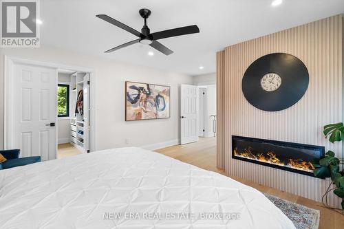 261 Pinetree Way, Mississauga, ON - Indoor Photo Showing Bedroom With Fireplace