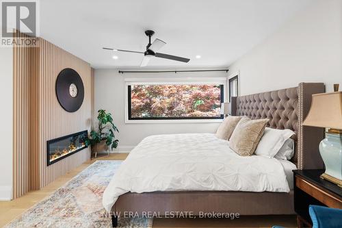 261 Pinetree Way, Mississauga, ON - Indoor Photo Showing Bedroom With Fireplace