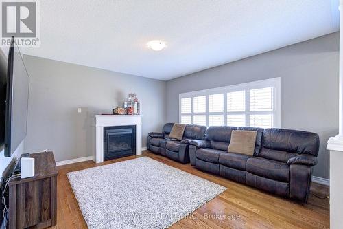 108 Decarolis Crescent, Essa, ON - Indoor Photo Showing Living Room With Fireplace