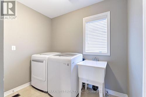 108 Decarolis Crescent, Essa, ON - Indoor Photo Showing Laundry Room