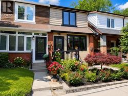 402 RHODES AVENUE Toronto, ON M4L 3A5