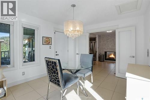 34 Leslie Place, Regina, SK - Indoor Photo Showing Dining Room With Fireplace