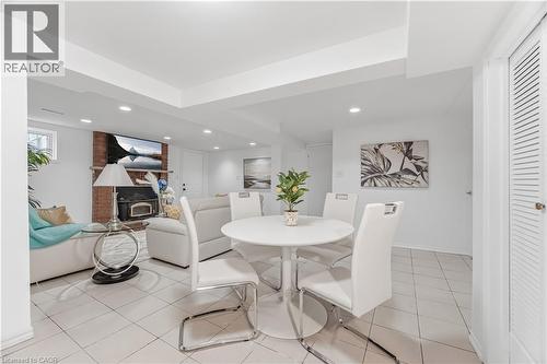 3332 Testimony Square, Mississauga, ON - Indoor Photo Showing Dining Room With Fireplace