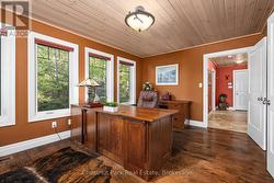Main floor office with walkout to balcony - 