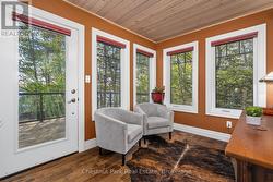 Main floor office with walkout to balcony - 