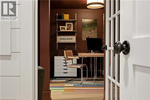 French doors with dark hardware open into a distinctive office space - 330 Camelot Court, Burlington, ON - Indoor
