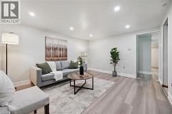 Bright interior space featuring light wood-finish flooring - 