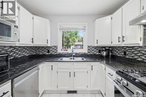 555 Nordstrum Road, Saskatoon, SK - Indoor Photo Showing Kitchen With Double Sink
