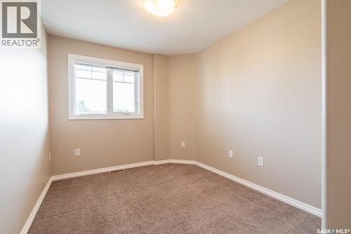 108 6345 Rochdale Boulevard, Regina, SK - Indoor Photo Showing Other Room