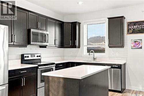 659 Secord Bend, Saskatoon, SK - Indoor Photo Showing Kitchen With Stainless Steel Kitchen With Upgraded Kitchen