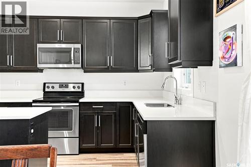 659 Secord Bend, Saskatoon, SK - Indoor Photo Showing Kitchen With Stainless Steel Kitchen With Upgraded Kitchen