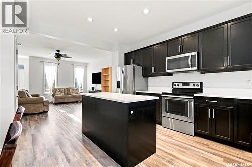 659 Secord Bend, Saskatoon, SK - Indoor Photo Showing Kitchen With Stainless Steel Kitchen