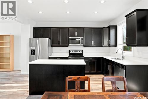 659 Secord Bend, Saskatoon, SK - Indoor Photo Showing Kitchen With Stainless Steel Kitchen With Upgraded Kitchen