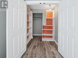 Primary Bedroom Walk-in Closet - 