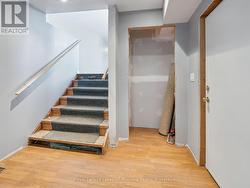 Foyer (Stairs to Main Floor/Kitchen/Dining) - 