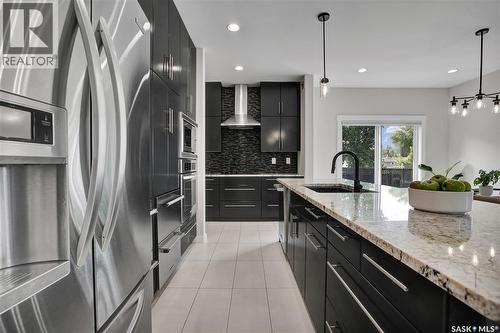102 Kinsmen Crescent, Martensville, SK - Indoor Photo Showing Kitchen With Upgraded Kitchen