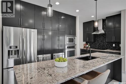 102 Kinsmen Crescent, Martensville, SK - Indoor Photo Showing Kitchen With Upgraded Kitchen
