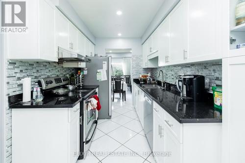 26 Roughfield Crescent, Toronto, ON - Indoor Photo Showing Kitchen With Double Sink With Upgraded Kitchen