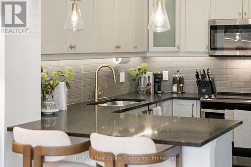 310 - 19 Stumpf Street, Centre Wellington (Elora/Salem), ON - Indoor Photo Showing Kitchen With Double Sink With Upgraded Kitchen