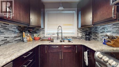 6 Higgins Bay, Regina, SK - Indoor Photo Showing Kitchen With Double Sink