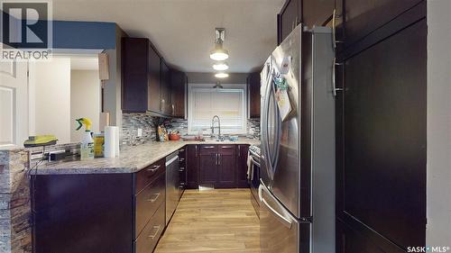 6 Higgins Bay, Regina, SK - Indoor Photo Showing Kitchen With Double Sink