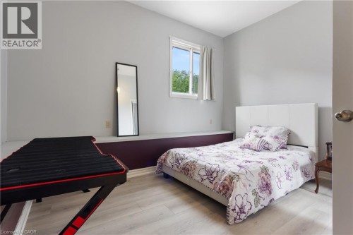 12'10 X 11'1 FT BEDROOM 2 - 25 Saunby Street, London, ON - Indoor Photo Showing Bedroom