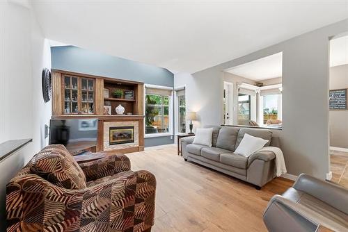 141 Invermere St, Winnipeg, MB - Indoor Photo Showing Living Room With Fireplace