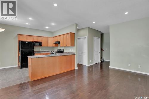3876 Robinson Street, Regina, SK - Indoor Photo Showing Kitchen With Double Sink