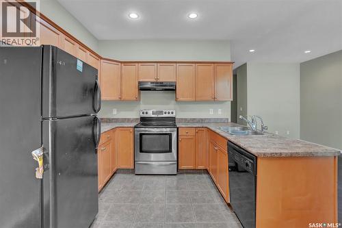 3876 Robinson Street, Regina, SK - Indoor Photo Showing Kitchen With Double Sink